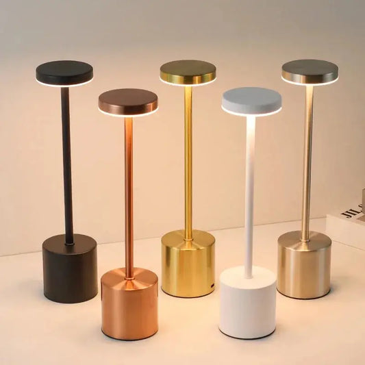 Oska™ – The Minimalist Ambient Lamp in five metallic finishes including black, copper, gold, white, and silver, ideal for modern desk lighting.